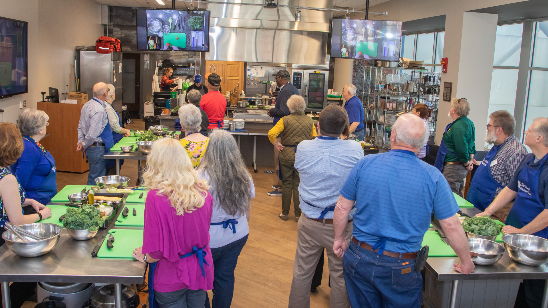 individuals participating in a cooking class
