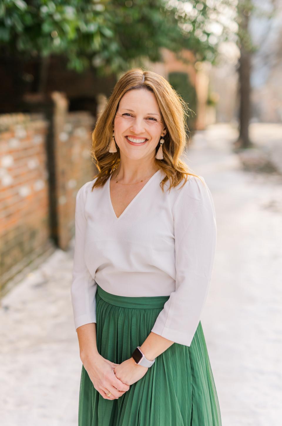Headshot of Ashton Potter Wright standing outside